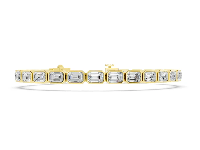 East-West Emerald Cut Diamond Tennis Bracelet Set in Yellow gold with Bezel Setting